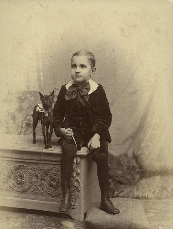 Little Boy With Dog